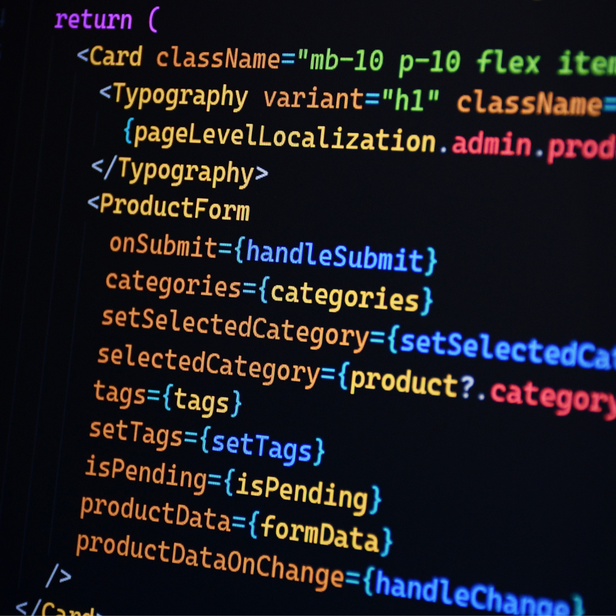 A black computer screen with colorful html coding.